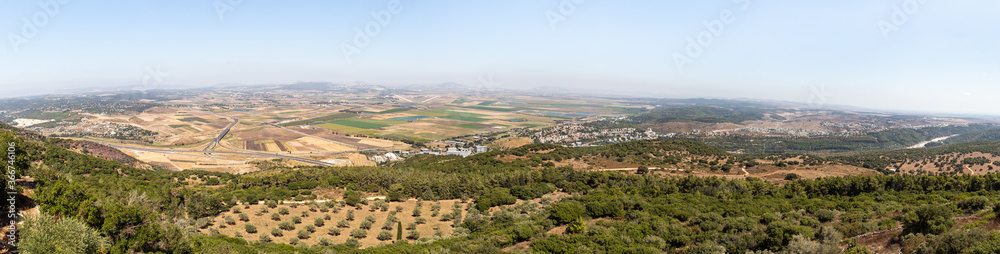 A view  from the roof of a Deir Al-Mukhraqa Carmelite Monastery on the adjacent valley with roads, settlements and fields in northern Israel