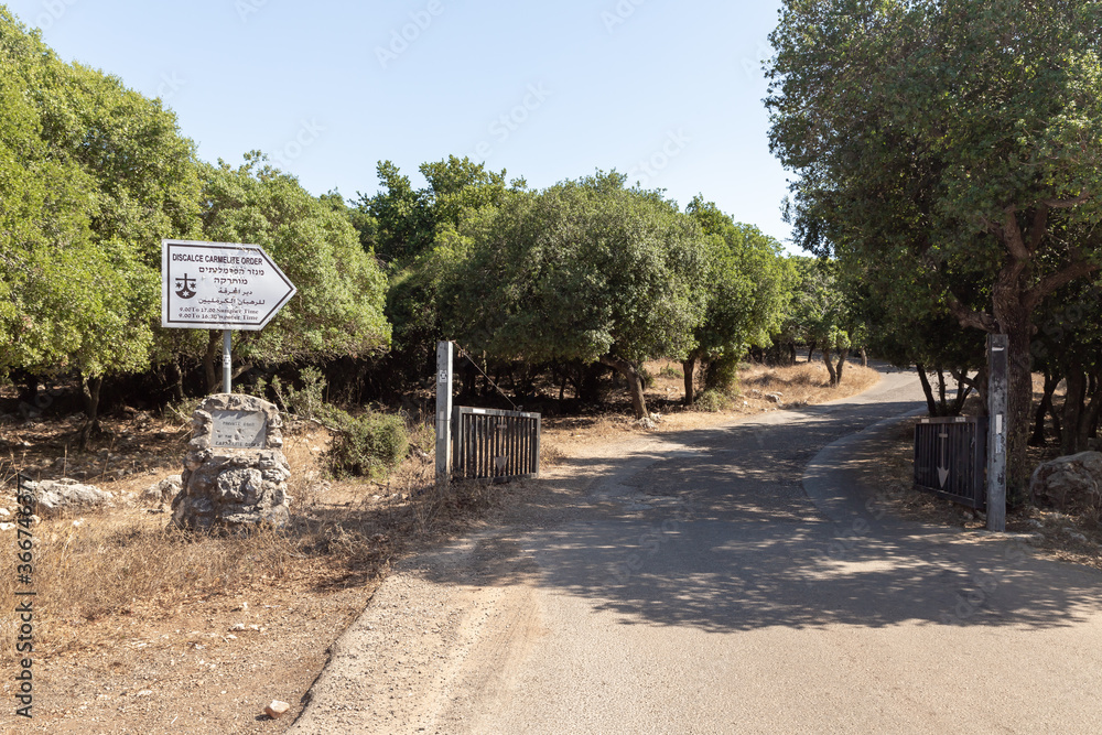 The signpost at the entrance to the territory of the Deir Al-Mukhraqa Carmelite Monastery in northern Israel The signpost at the entrance to the territory of the Deir Al-Mukhraqa Carmelite Monastery in northern Israel