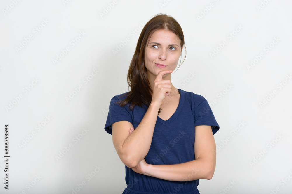 Portrait of young beautiful woman against white background Portrait of young beautiful woman against white background