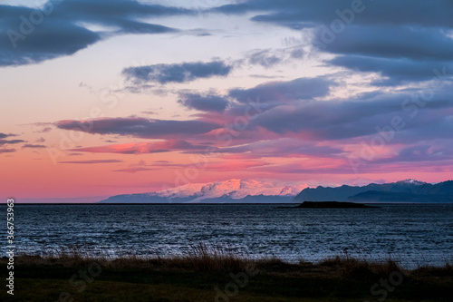 Snowy mountains at sunrise from Hofn in South East Iceland