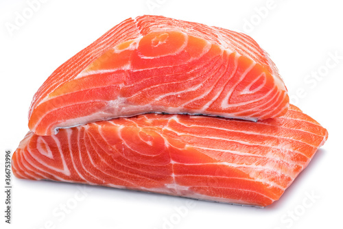 Fresh raw salmon fillets on white background.