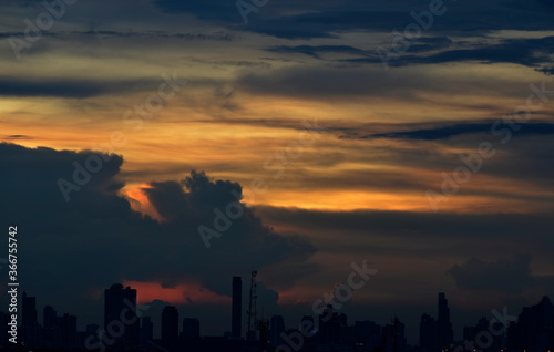 Sunset over a city with raincloud   Bangkok  Thailand