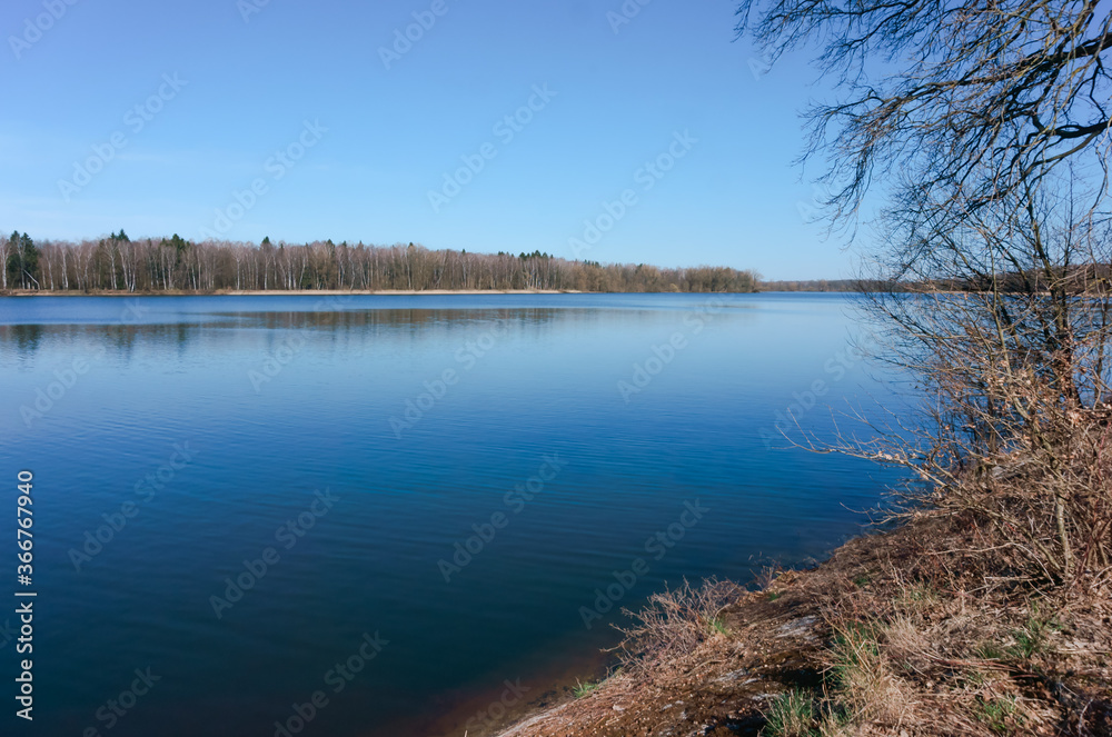 Landscape of lake and autumn forest.