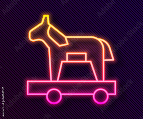 Glowing neon line Trojan horse icon isolated on black background. Vector.