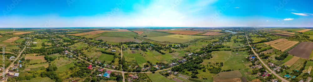 Naklejka premium the Porono-Pokrovsky farm not far from the village of Lvovskaya (South of Russia, Krasnodar Territory) - streets and houses of the classical village architecture of the Kuban - aerial panorama