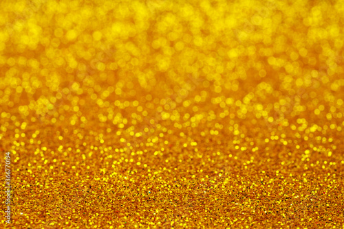 Abstract yellow glitter background © Roman Ivaschenko