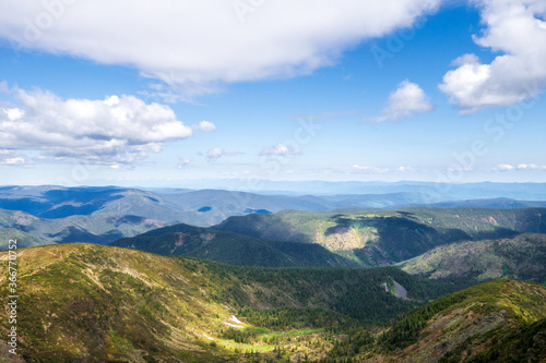 Magnificent view of the mountains from the Chersky peak. Mountain valley of Khamar-Daban in summer. © nika_lu