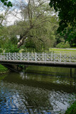 romantic bridge over pond in Spa park in Naleczow, Poland