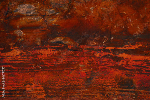 Fototapeta Naklejka Na Ścianę i Meble -  Dark red saturated abstract background. Minerals. Stone texture. Blank for design. Textured background for interior decoration or packaging. Solid concept.
