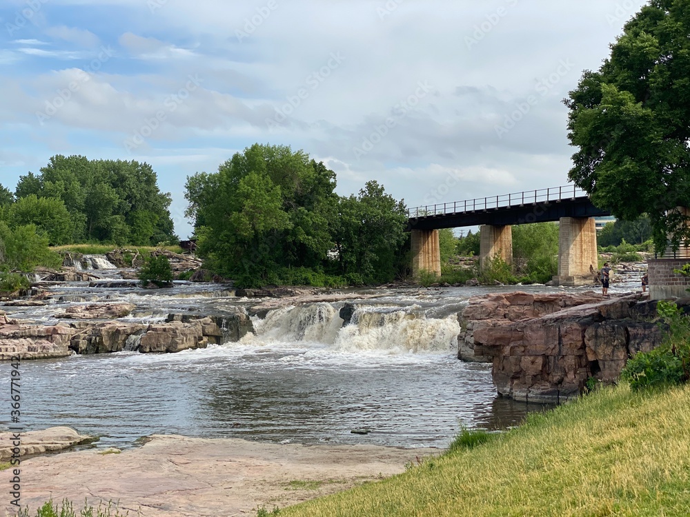 Bridge over the river in the forest of Sioux Falls