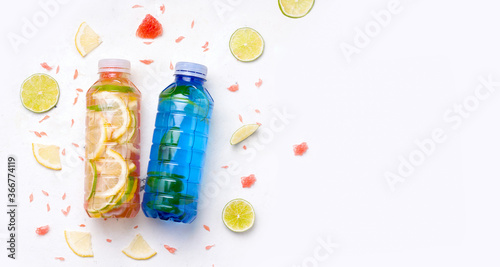 Sports drinks in bottles on a white background. Copy space
