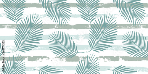 Tropical pattern, palm leaves seamless vector floral background. Exotic plant on blue stripes print illustration. Summer nature jungle print. Leaves of palm tree on paint lines. ink brush strokes