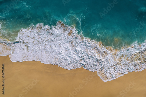 Aerial view of Ocean wave and Kelingking Beach in Nusa Penida island, Bali in Indonesia. © tawatchai1990
