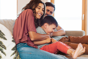 Young family having fun at home