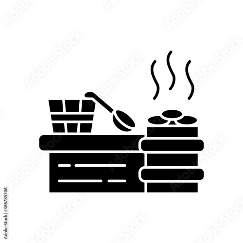 Steam room black glyph icon. Sauna recreation, vaporarium silhouette symbol on white space. Steam bath, bathhouse accessories. Water bucket, wooden spoon and heated stones vector isolated illustration