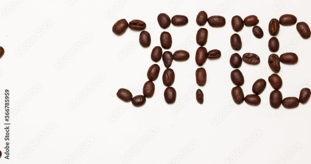 Stop motion animation close up view of word Coffee made of coffee beans on white background isolated. Stop motion animation close up view of word Coffee made of coffee beans on white background isolated.