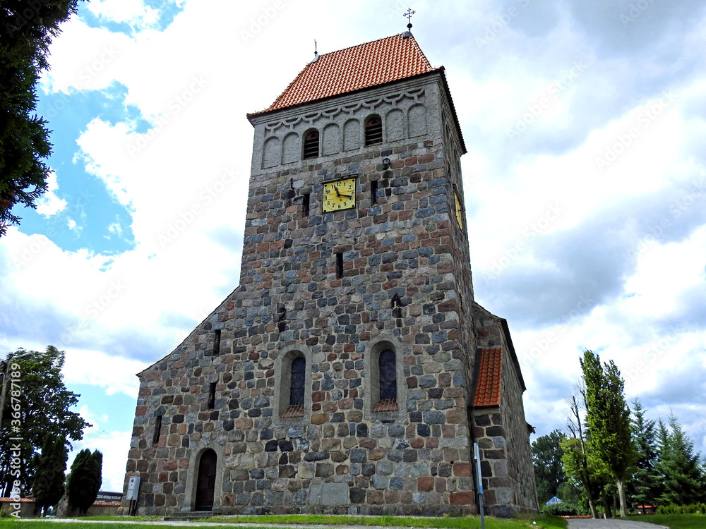 Fototapeta premium built in 1924, the Catholic Church of the Assumption of the Blessed Virgin Mary in Kalinowo in Warmia and Masuria in Poland