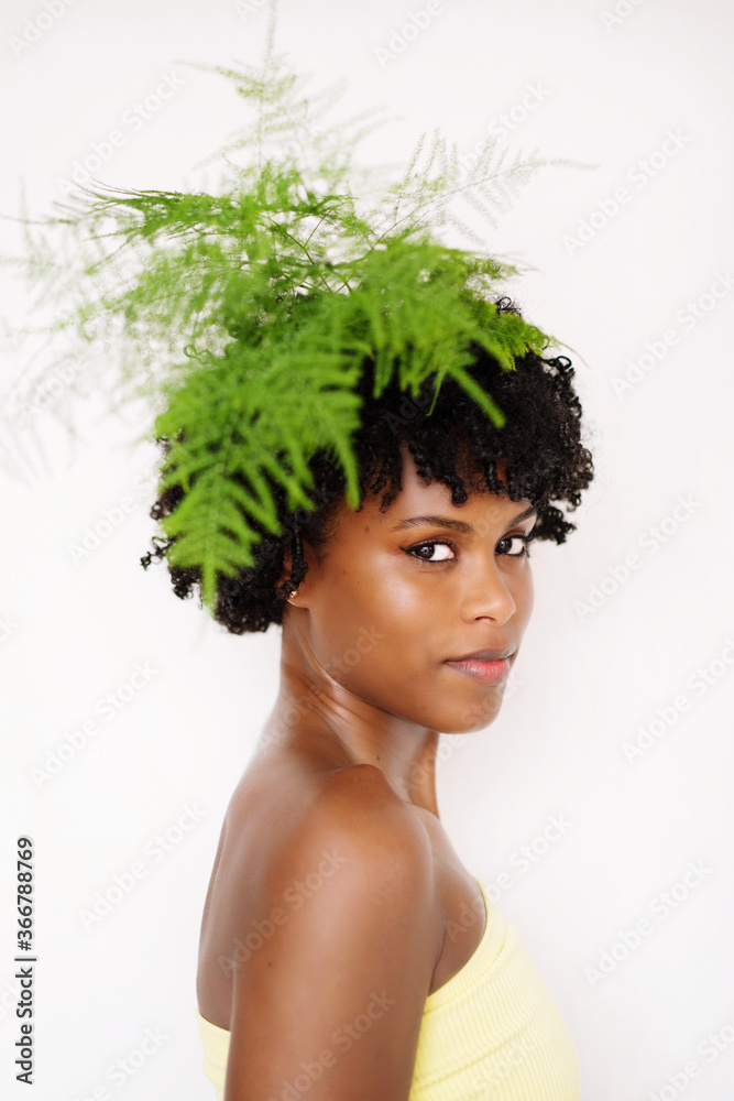 Black woman with the green plant Black woman with the green plant