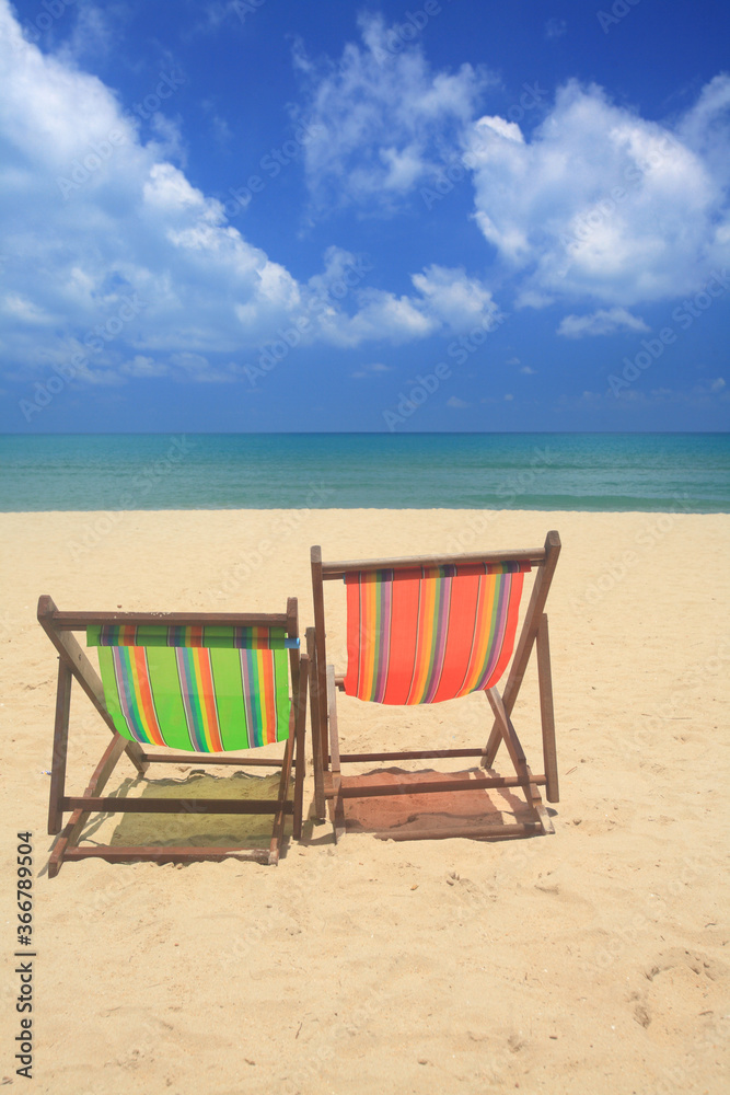 beach chairs on a tropical beach