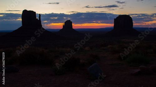 Famous view of Monument Valley before sunrise with the Mittens and Merrick butte