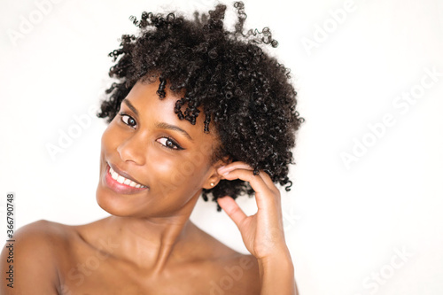 Young black woman candid smiling