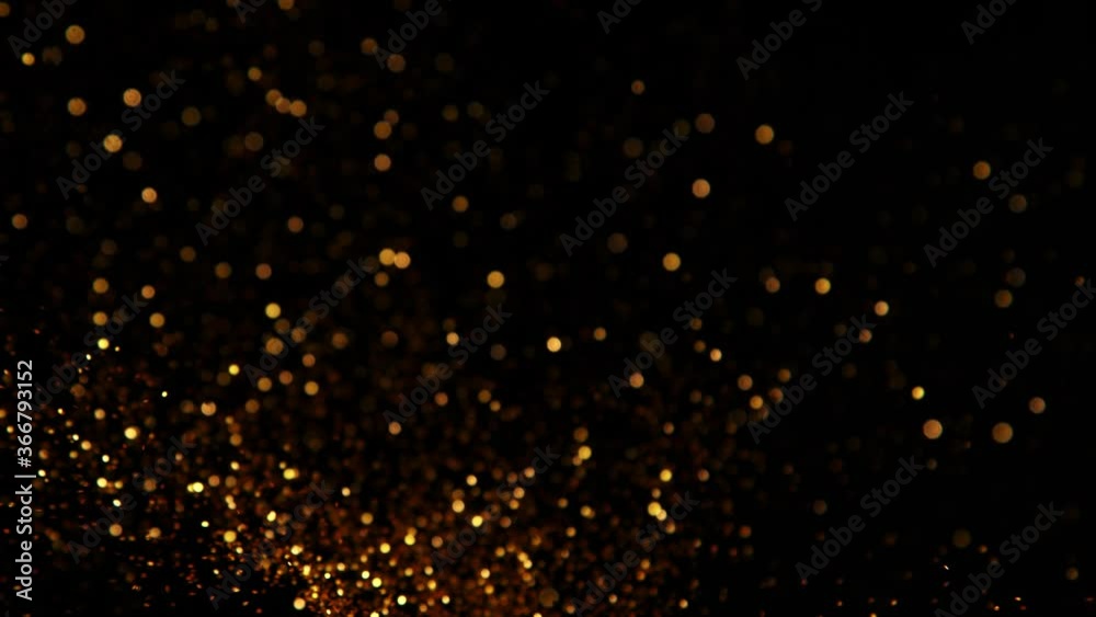 Golden Glitter Background in Super Slow Motion at 1000fps. Golden Glitter Background in Super Slow Motion at 1000fps.