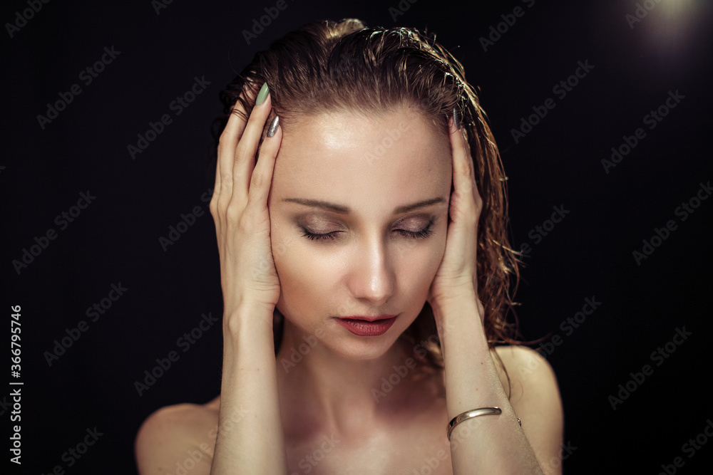 Fototapeta premium Beautiful woman on black background in studio
