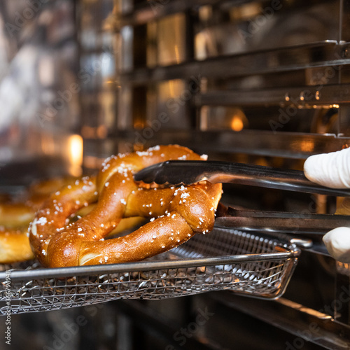 Worker taking out Pretzel photo