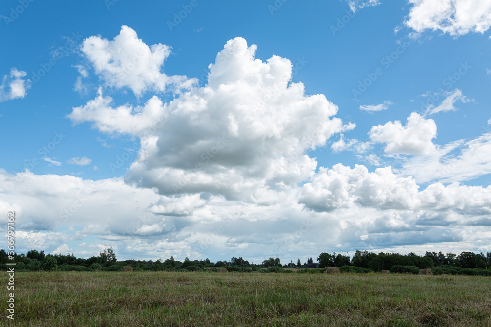 Blue sky and clouds over the summer field. Blue sky and clouds over the summer field.