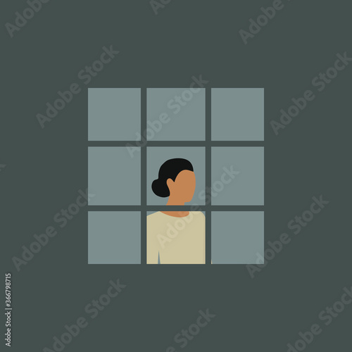 Woman at the window behind bars