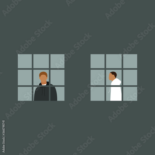 Men in the window behind bars