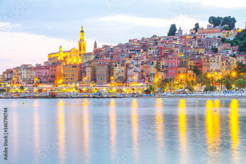 Menton mediaeval town on the French Riviera in the Mediterranean during sunset, France. 