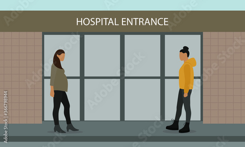 Two female characters approach the hospital entrance