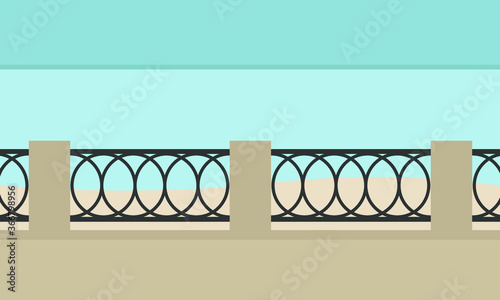 Fence of the promenade on the background of the sea and the beach