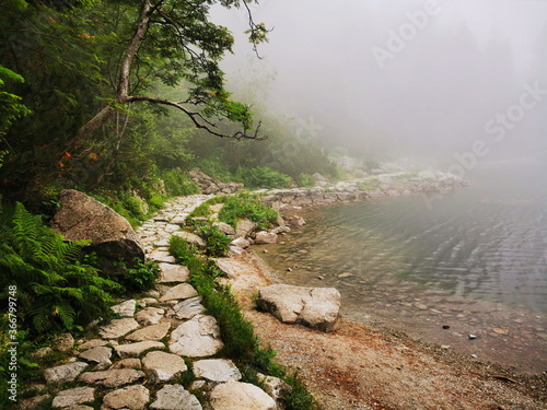 Hazy trail around Morskie Oko. Tatra Mountains Poland Zakopane.