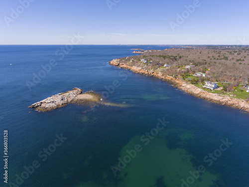 Historic coastal buildings and Normans Woe Rock aerial view on Gloucester Harbor in village of Magnolia in Gloucester, Cape Ann, Massachusetts MA, USA.