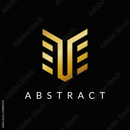 TE E T letter logo Icon design golden color
