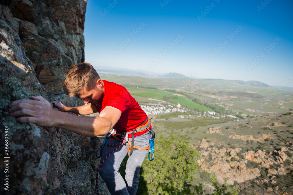The climber trains on a natural relief