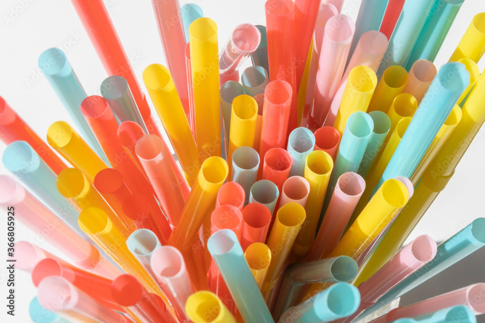 Colourful straws arranged in a vibrant display. Colourful straws arranged in a vibrant display.