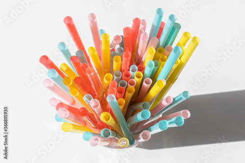 Colourful straws arranged in a vibrant display. 