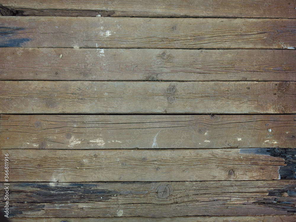 thick wooden sleepers made of old logs, brutal and harsh background thick wooden sleepers made of old logs, brutal and harsh background