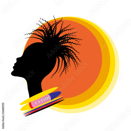 Abstract black silhouette of african woman with colorful national decoration on a background of the sun.