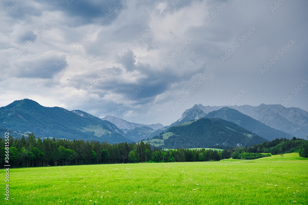 thunder clouds over the Austrian Chiemgau Alps