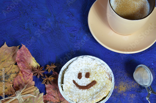 coffee cookies and spices on dark blue background. stylish winter or autumn flat lay. space for text. cozy mood autumn. seasonal holidays concept. blogger.