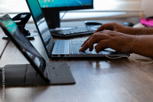 tablet with leptop and computer in office