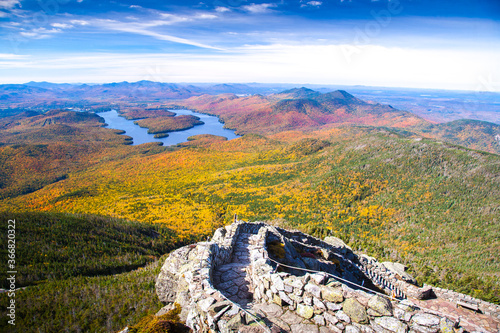 A view of Lake Placid on a sunny autumn day as seen by looking south west from the summit of Whiteface Mountain in Adirondack National Park, Upper New York photo