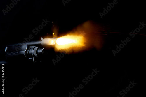 Slika na platnu Realistic shotgun shot with muzzle flash