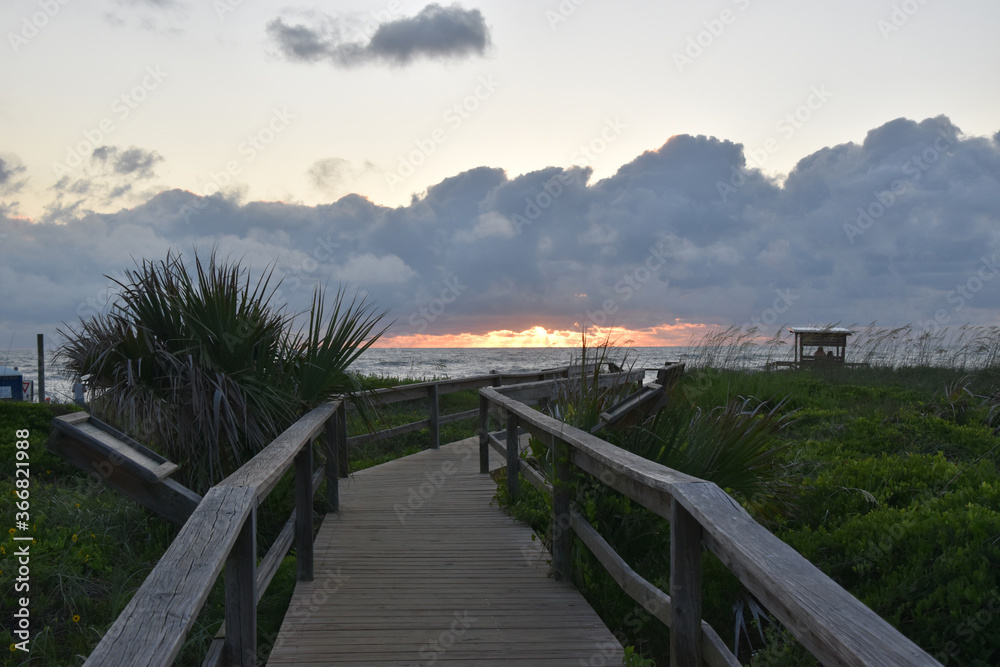 Walkway to the sea and a view of the sunrise