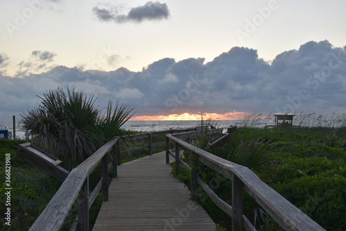 Walkway to the sea and a view of the sunrise