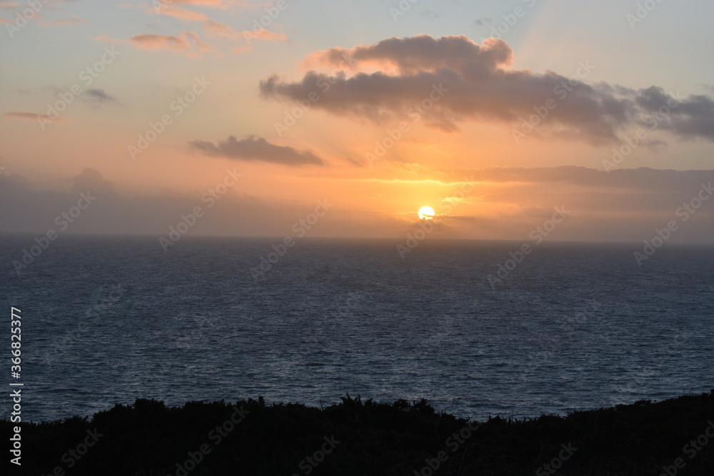 Naklejka premium sunset over the UK Atlantic ocean